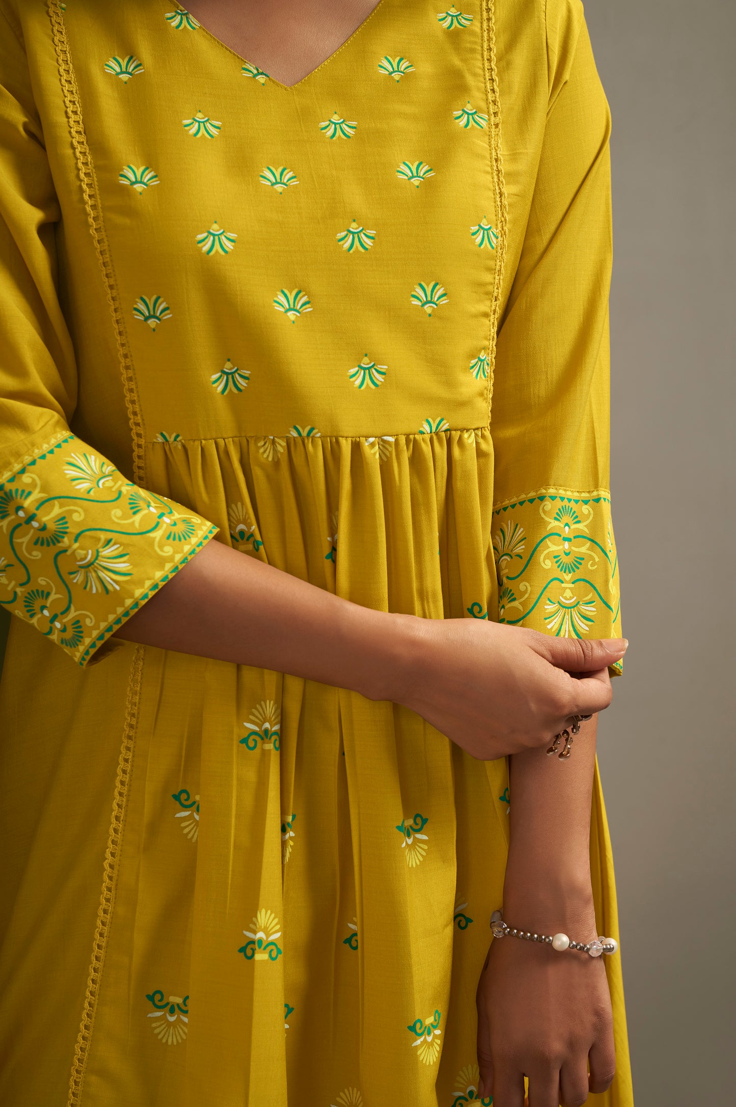 Women's Cotton Blend Ethnic Motifs Printed Flared Kurta with Solid Elasticated Pants & Printed Nazmin Cotton Blend Dupatta